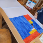 Ein fast fertiges Bild eines Kindes, angelehnt an das Bild „Äquivalenz an den Horizontalen“ von Camille Graeser.